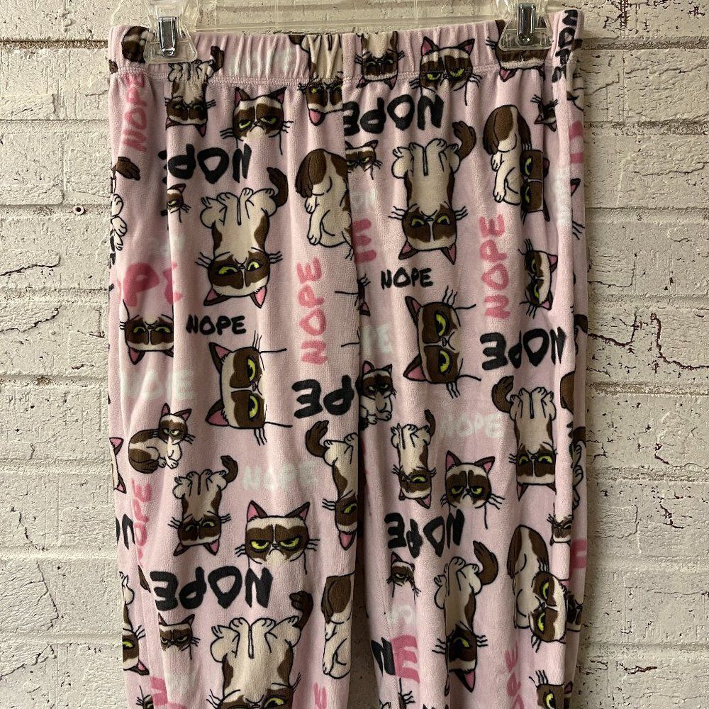 Grumpy Cat pj Pant, pink with Grumpy Cat graphic and the word “NOPE” all over XS
